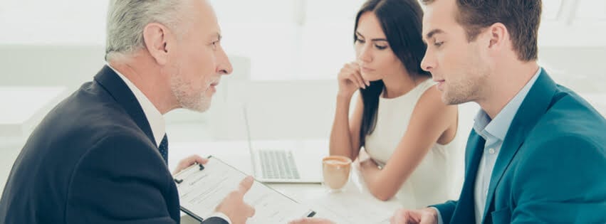 Lawyer speaking with clients