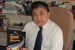 Hongbo Du with his book