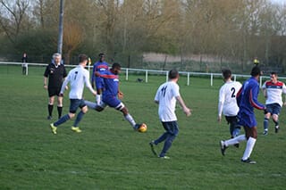 Players and referee during the match