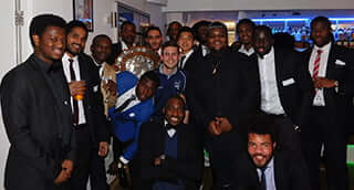 The winning UBFC team celebrates at the University