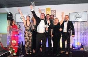 Employees of Mitre Pub celebrating as it is named Pub of the Year