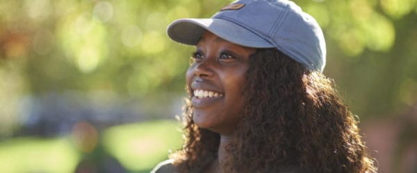 female student smiling on campus