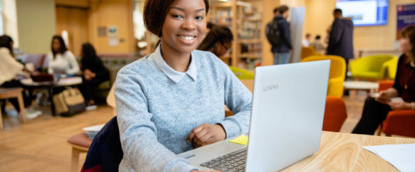 Student studying on a laptop in the Vinson Building