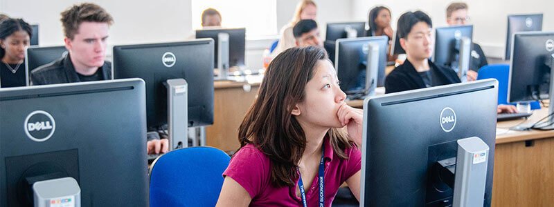 University students studying at computers