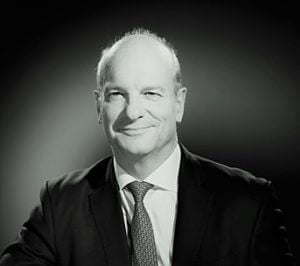 Black and white portrait photograph of Chris Hollis