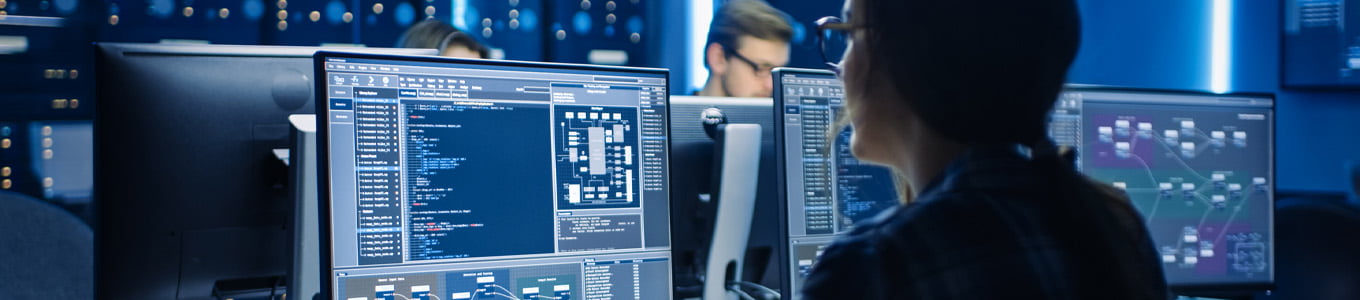 Female working on code on computer screen