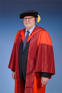 Portrait photograph of Dr László Lang