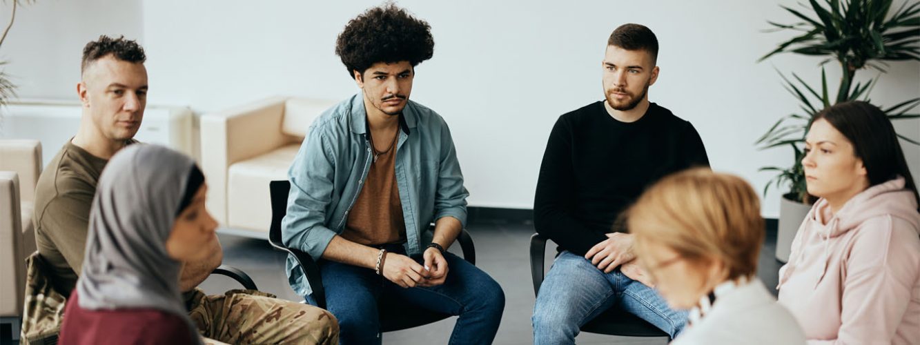 Group of people in group therapy style session