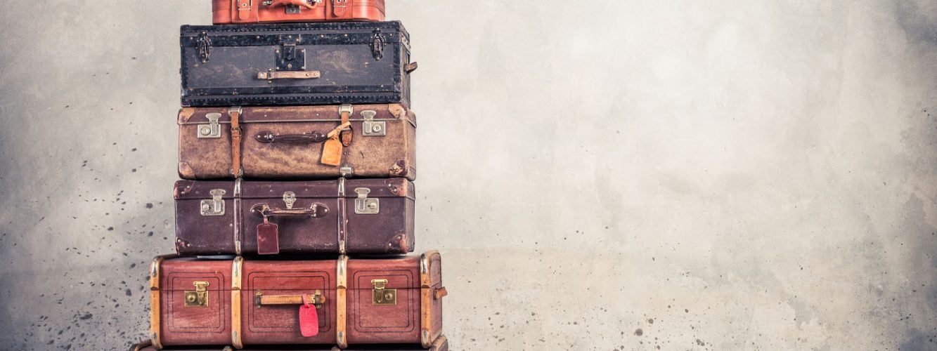 Old suitcases stack upon eachother