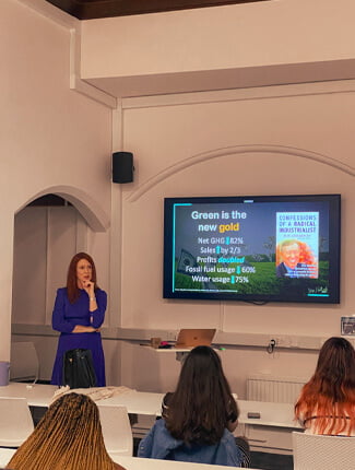 Rose Heathcote giving a presentation