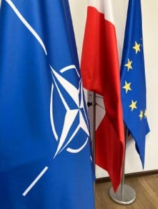 The NATO, Polish and EU flags