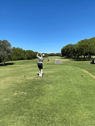 Liam playing golf