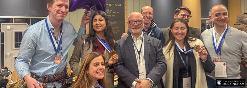 People gathered at event with Professor Adolfo Paolini
