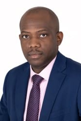 Professional portrait photograph of Dr. Adekunle Osibogun