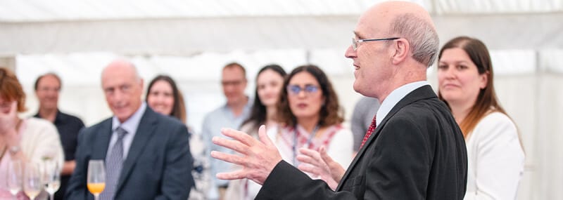 Speaker at the MED15 reunion event in marquee