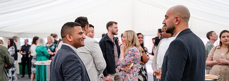 Guests speaking at reunion