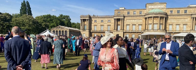 Patricia standing in the grounds of Buckingham Palace during the Garden Party
