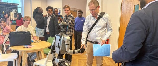 Humanoid Robot shaking hands with James Slater in Verney Park Cafe