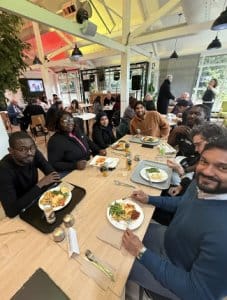 Academics and students in the OTM enjoying a celebratory lunch after the Grand Challenge Project 