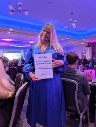 Anette with her certificate at the HELOA awards night