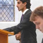 Musa speaking in Buckingham's Moot Court