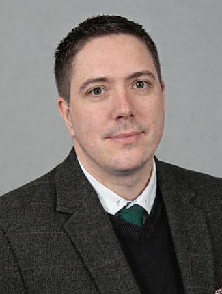 Portrait photograph of Stuart Mitchell