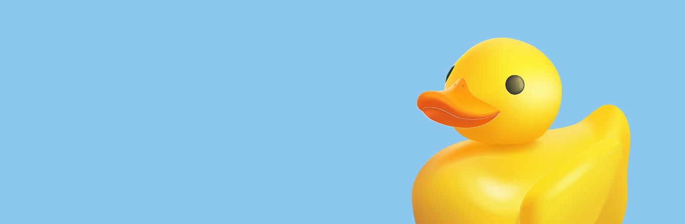 Rubber duck on blue bacground